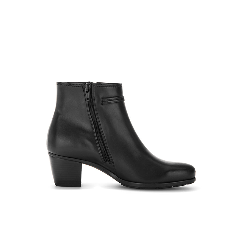 Women's black leather ankle boot with side zipper and mid-height block heel