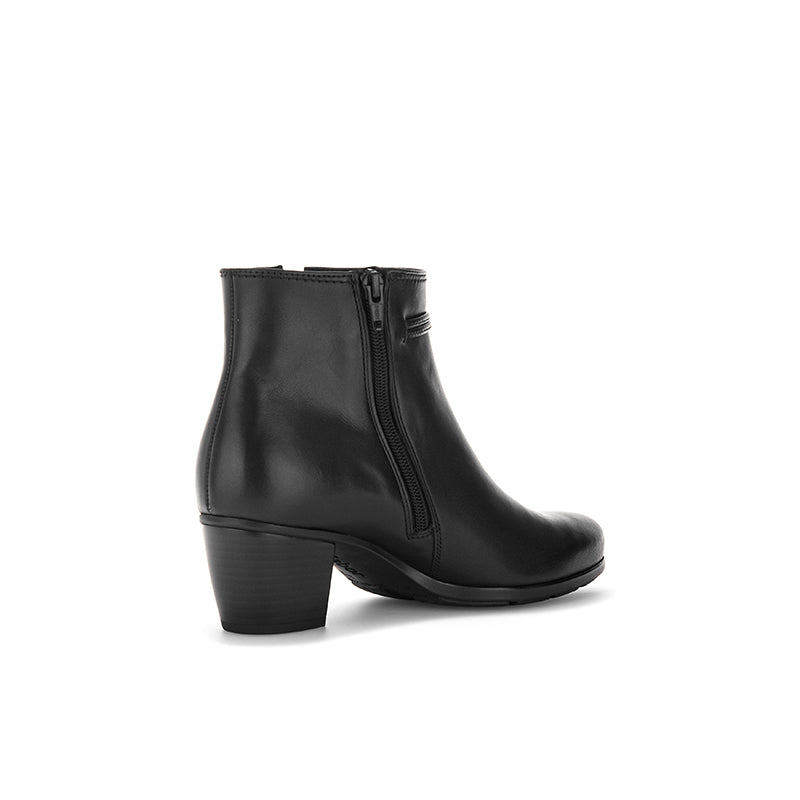 Women's black leather ankle boot with side zipper and chunky low heel