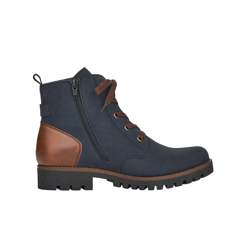 Women’s blue high-top zip boot with lace-up and brown accents, rugged tread sole