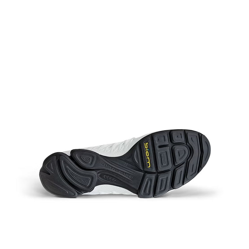 White leather sneaker outsole with tread pattern, heel view