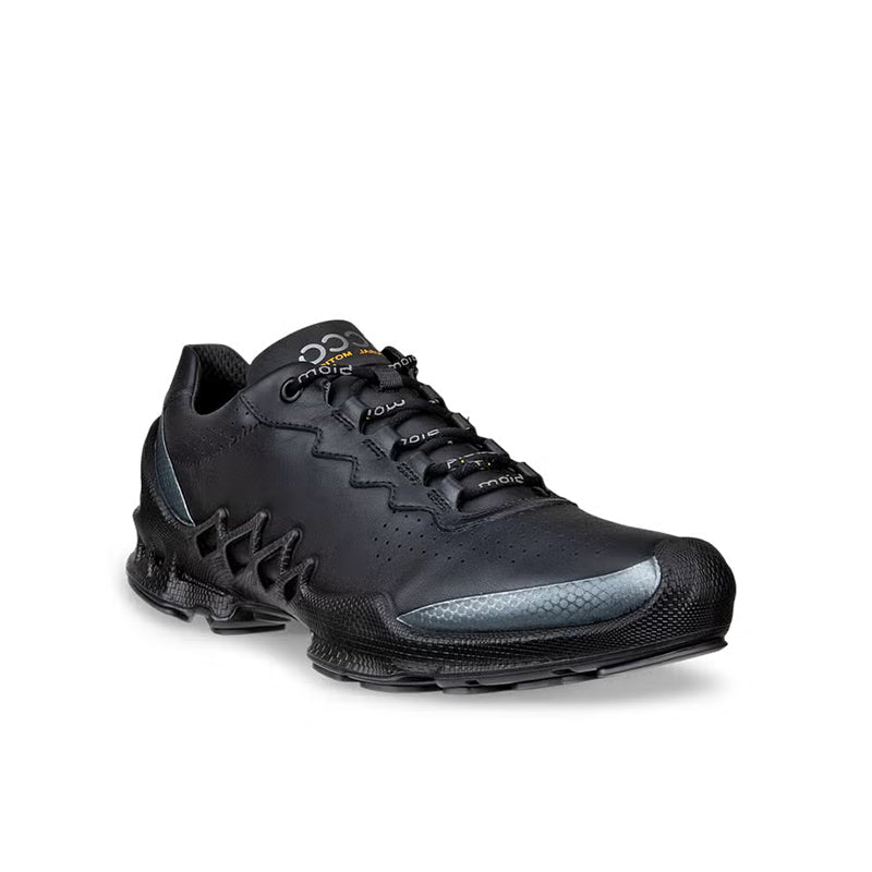 Black leather lace-up sneakers with cushioned sole and lace-up closure, side view