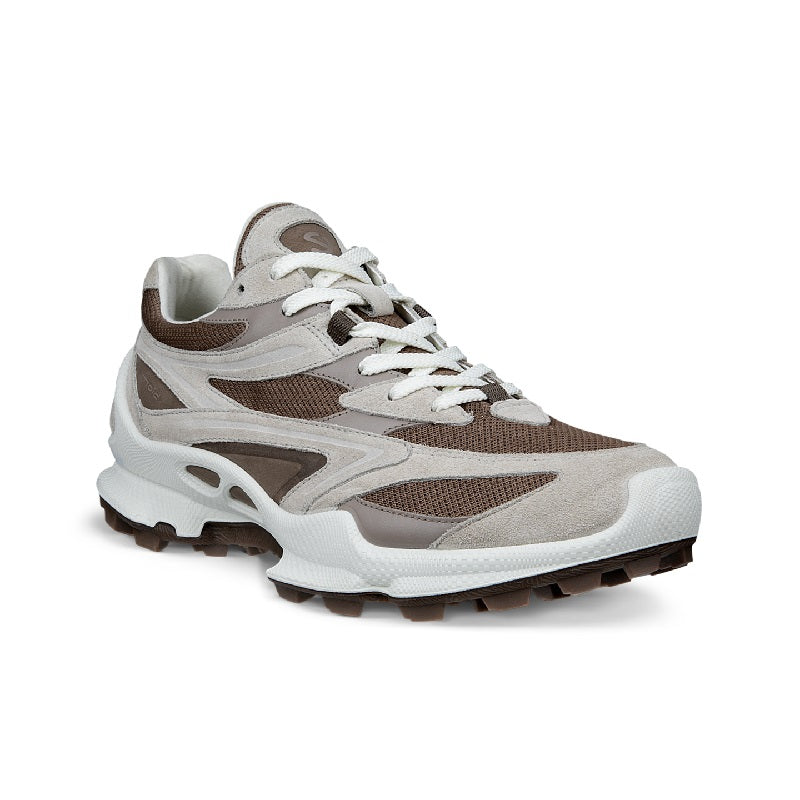 Men's taupe lace-up trail sneakers with brown overlays, white midsole, treaded outsole
