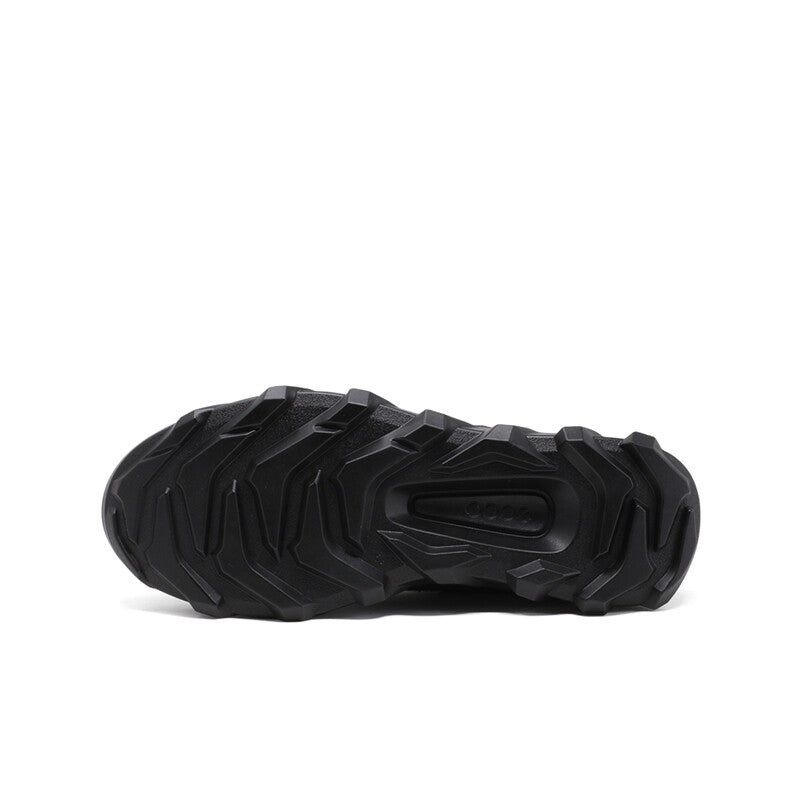 Black men's sneaker outsole with deep traction tread and heel pod