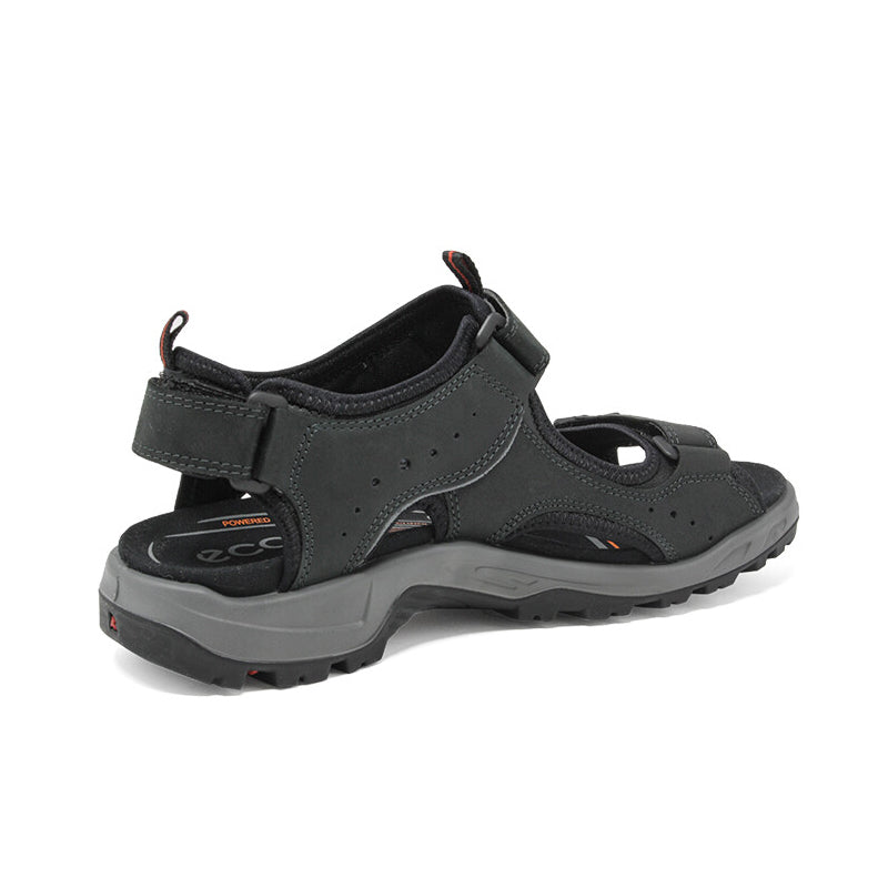 Men's black leather sandals with ankle strap, toe cutouts, and chunky rubber sole