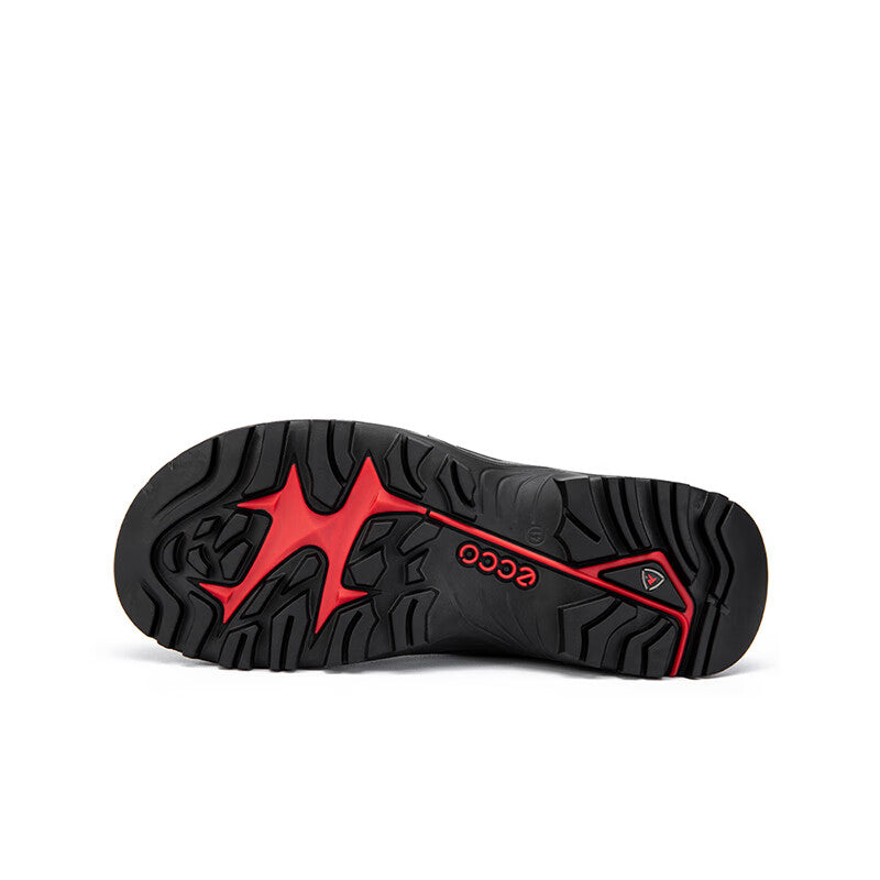 Men's off-road trainer outsole, black with red logo and deep traction lugs