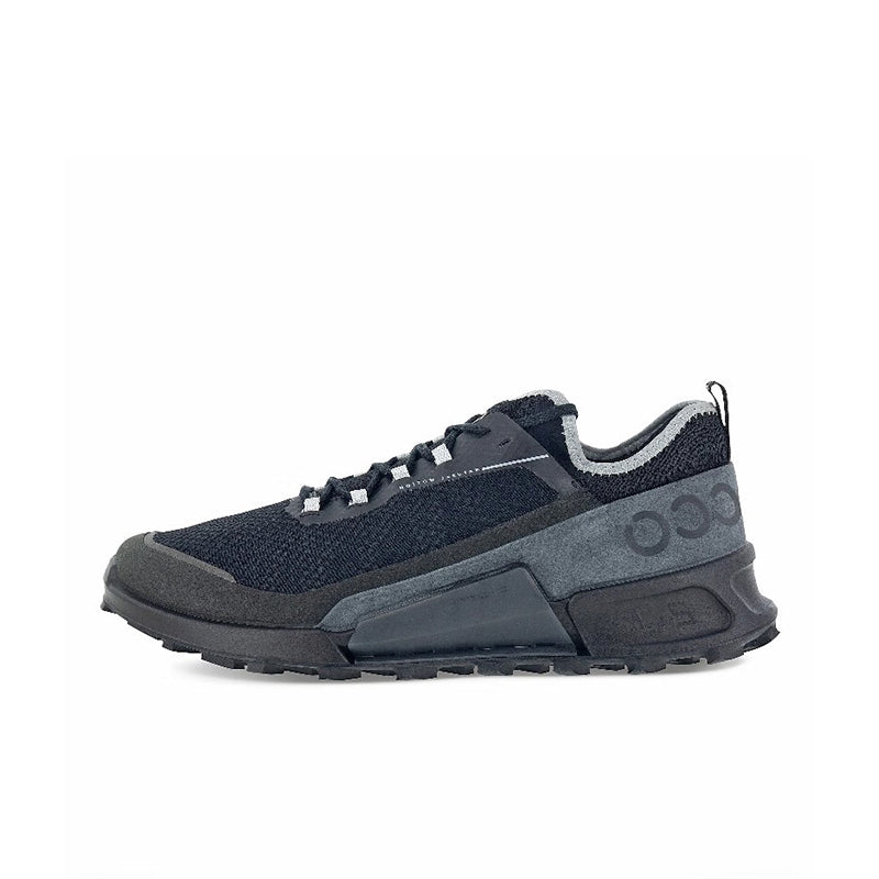 Men's dark navy lace-up trail sneakers with chunky midsole and textured upper
