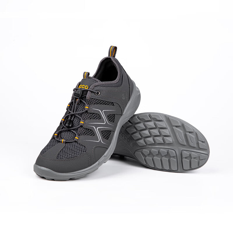 ECCO men's dark grey sneaker sole and heel with tread pattern and lace-up upper