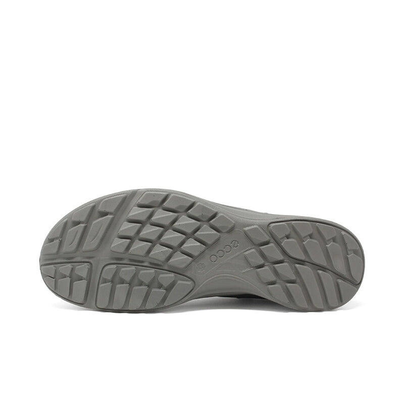 Men's dark grey sneaker outsole with rugged traction tread