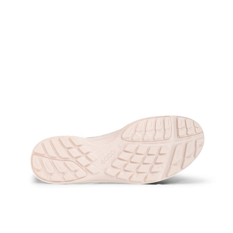 Pink-tinted rubber outsole tread for women's sneakers, traction grooves
