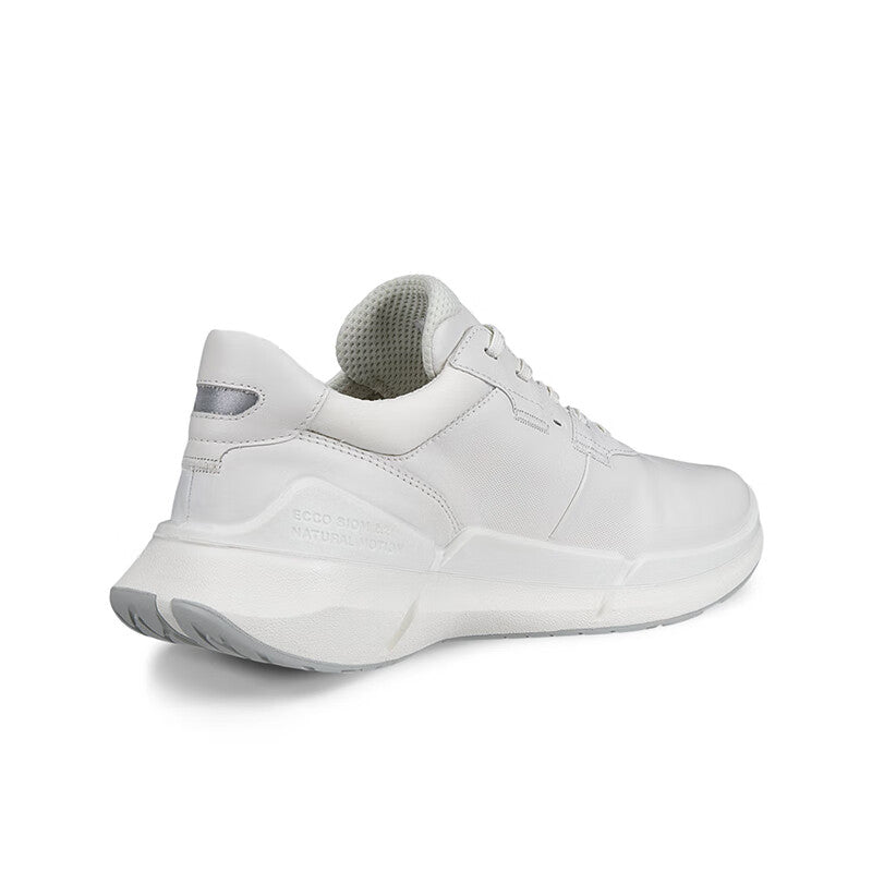 White leather women's sneakers with cushioned heel collar and thick cushioned sole