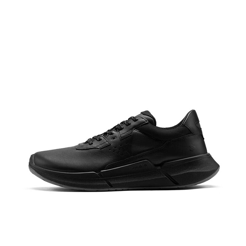 Black men's lace-up sneakers with smooth panels and thick rubber sole