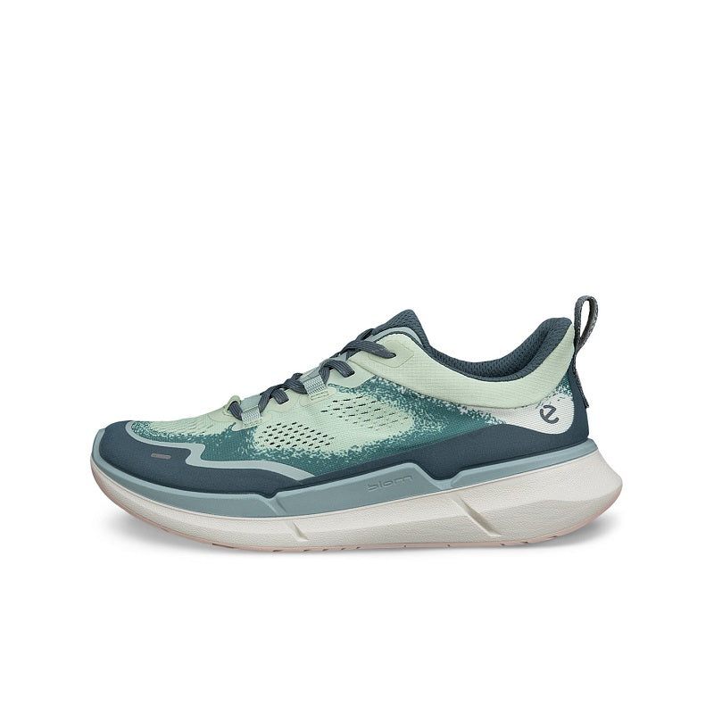 Women’s leather sneakers in teal and light green with lace-up closure and thick sole