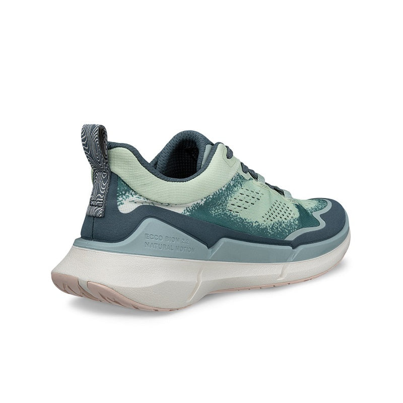 Women’s leather sneakers in teal and light green with lace-up closure and cushioned collar