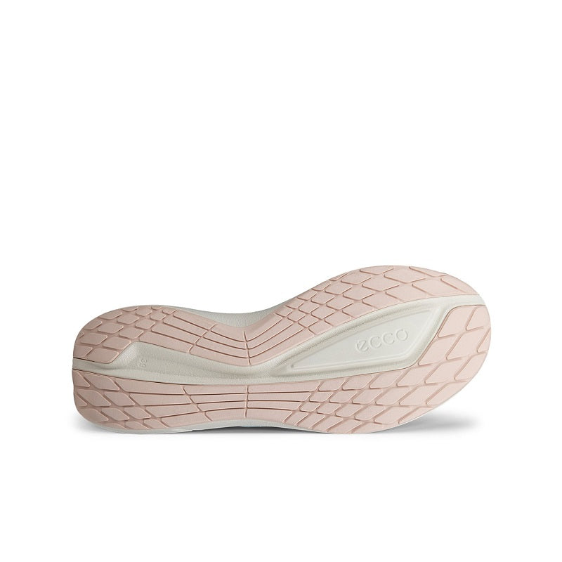 Sneaker outsole view in light color with diamond tread and pale trim