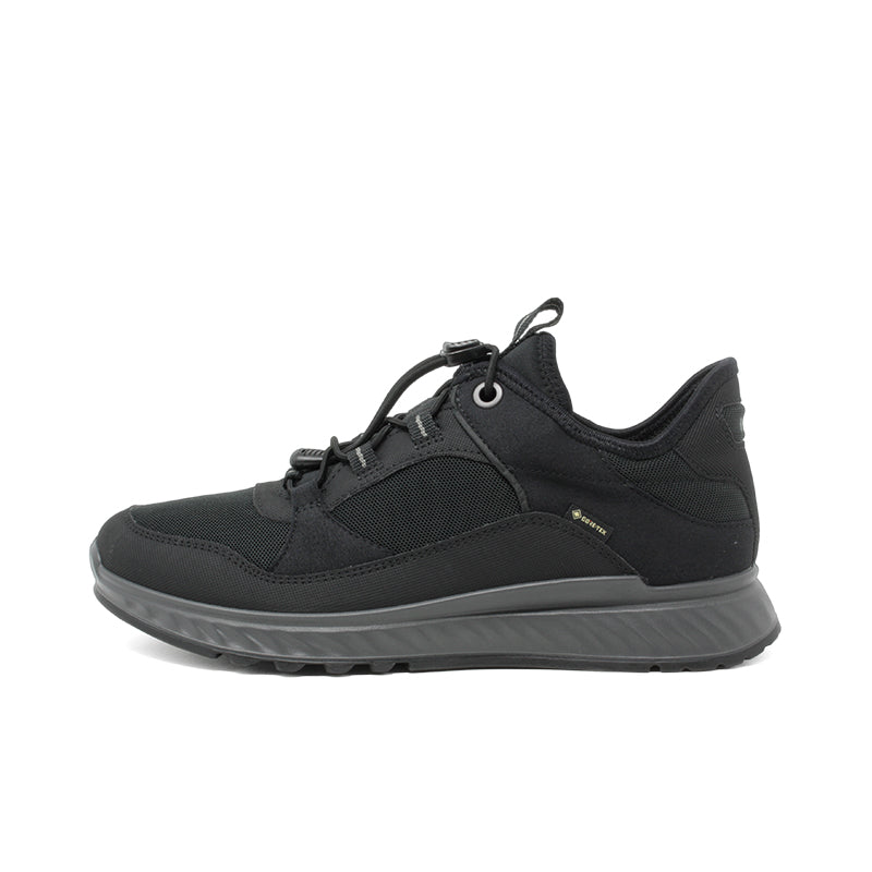 Black low-top women's sneaker with lace-up closure and textured side panels