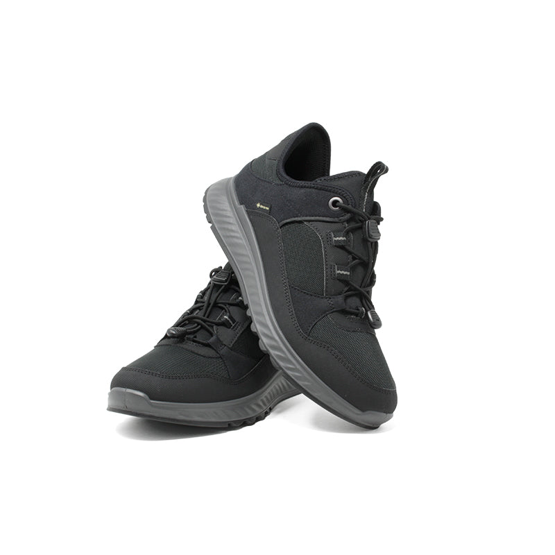 Black lace-up women's sneakers, side and front view with textured upper and rubber sole