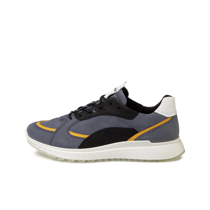 Men's leather sneakers with dark navy upper, black overlays, and yellow trim, lace-up.