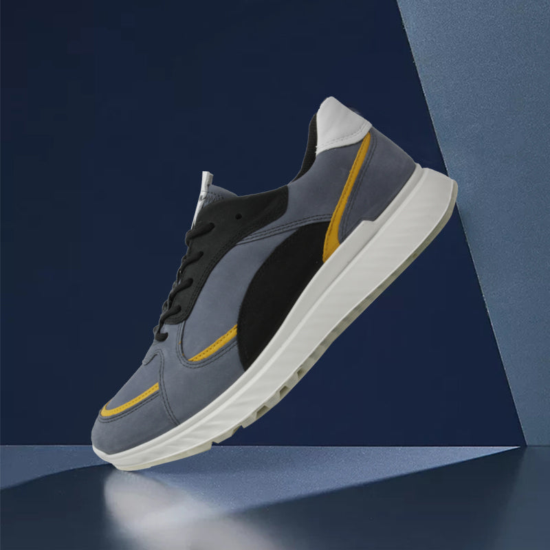 Men's leather sneakers with blue upper, black side panel, and yellow trim, lace-up.