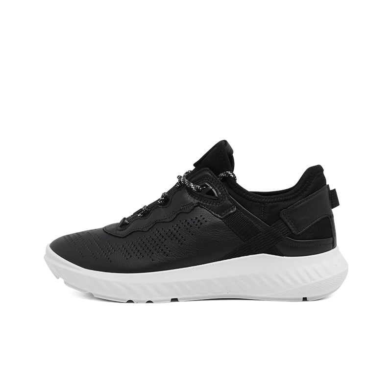 Women’s black lace-up sneakers with breathable texture, padded collar, and white sole