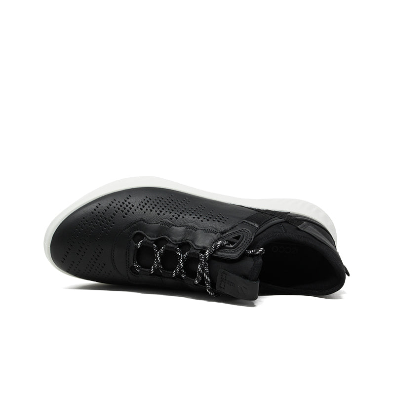 Women’s black sneaker side view with perforated upper, lace-up front, and white midsole