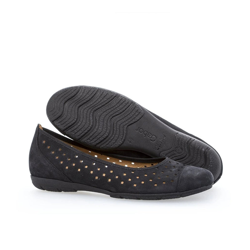 Dark blue flat walking shoe with treaded outsole and perforated side panel