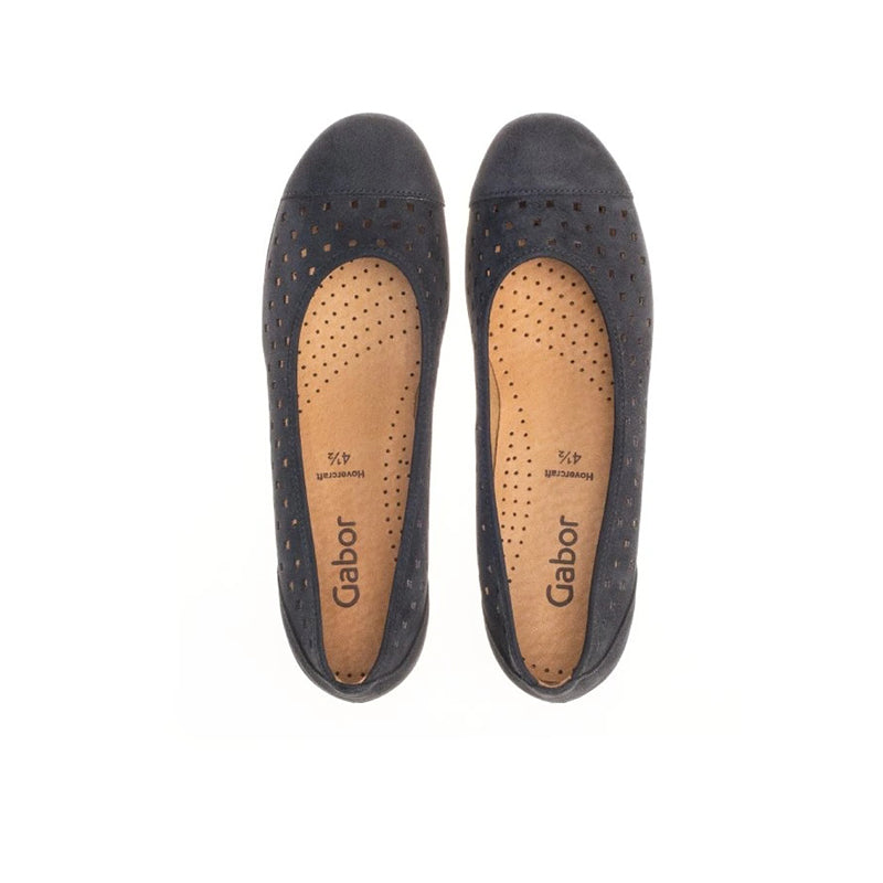 Pair of dark blue flats with insoles showing Gabor branding