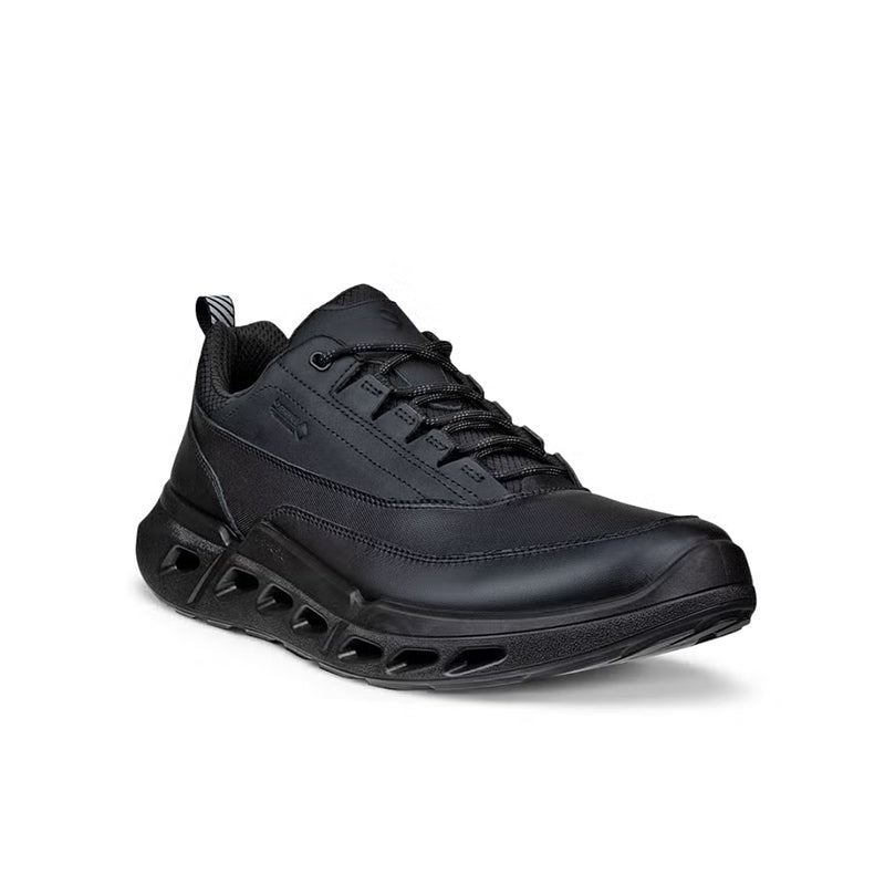 Black men’s leather sneakers with lace-up closure and thick tread sole