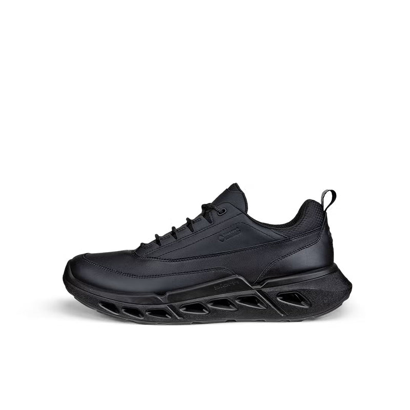 Black lace-up sneakers with cushioned midsole and sculpted outsole