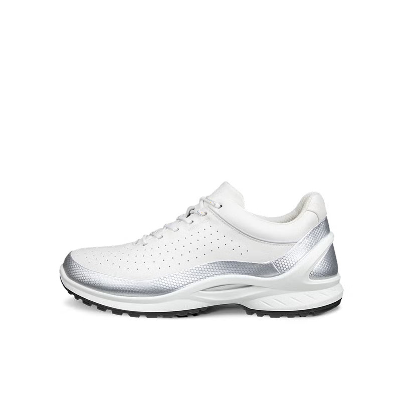 White lace-up sneaker with textured side panels and cushioned tread sole