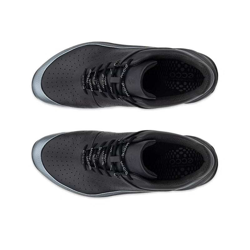 Black lace-up sneakers with perforated uppers and mesh-like lining openings