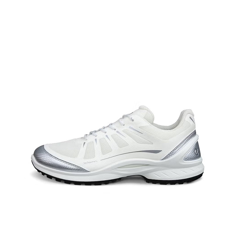 White lace-up sneakers with chunky tread sole and silver-toned side detail