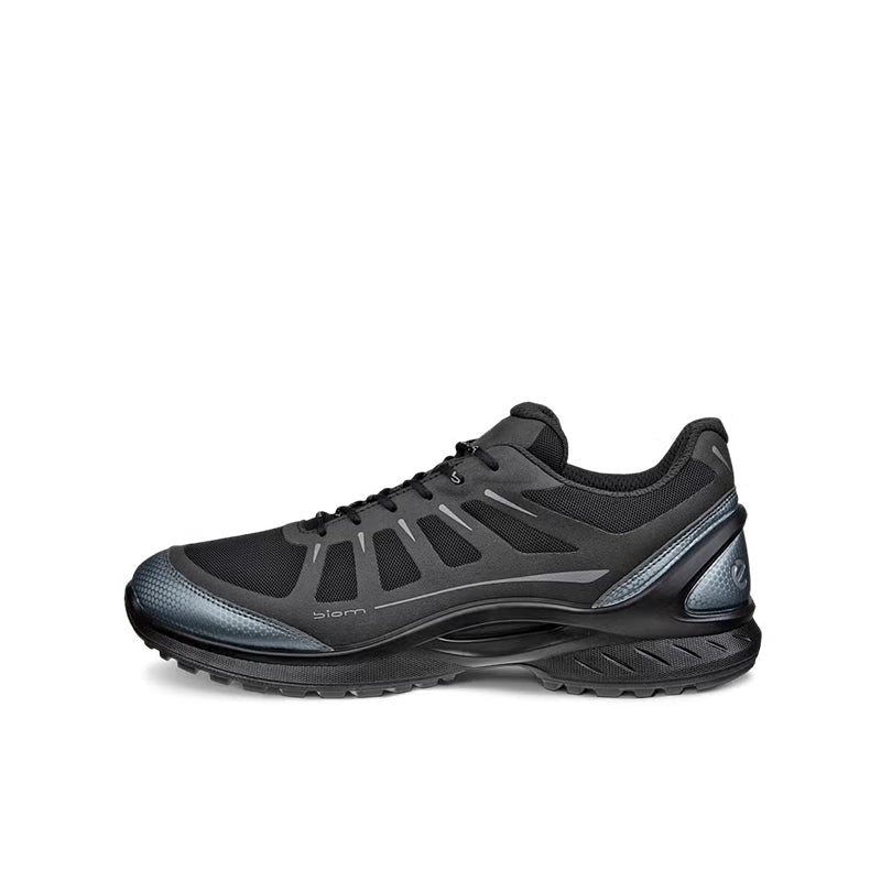 Men's lace-up running sneakers with dark upper, silver trim, and sculpted midsole