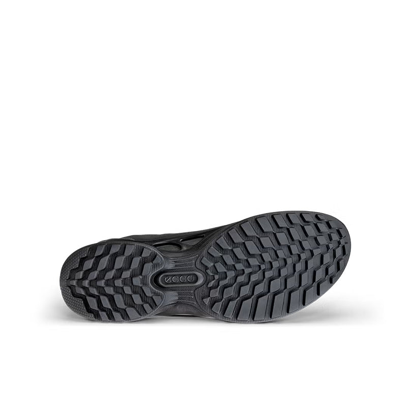 Men's sneaker outsole with deep tread pattern and rubber heel grip