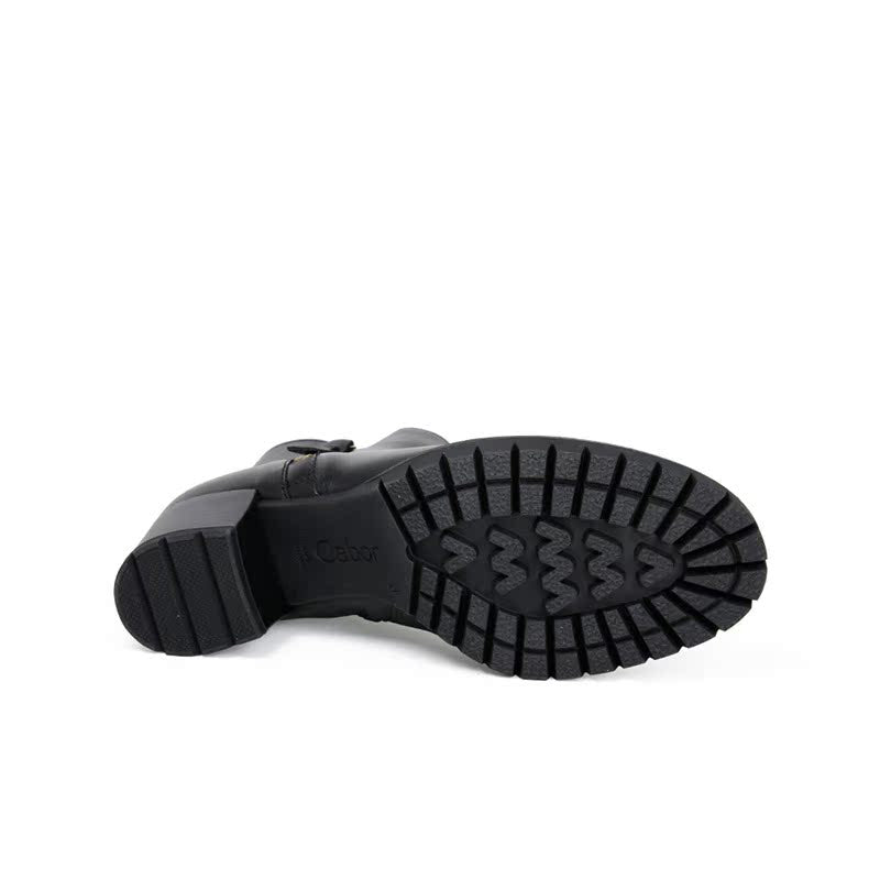 Black boot outsole with rugged tread