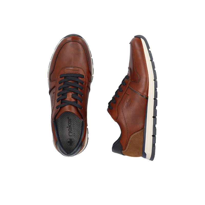 Brown lace-up sneakers shown front and side with dark laces and white sole trim
