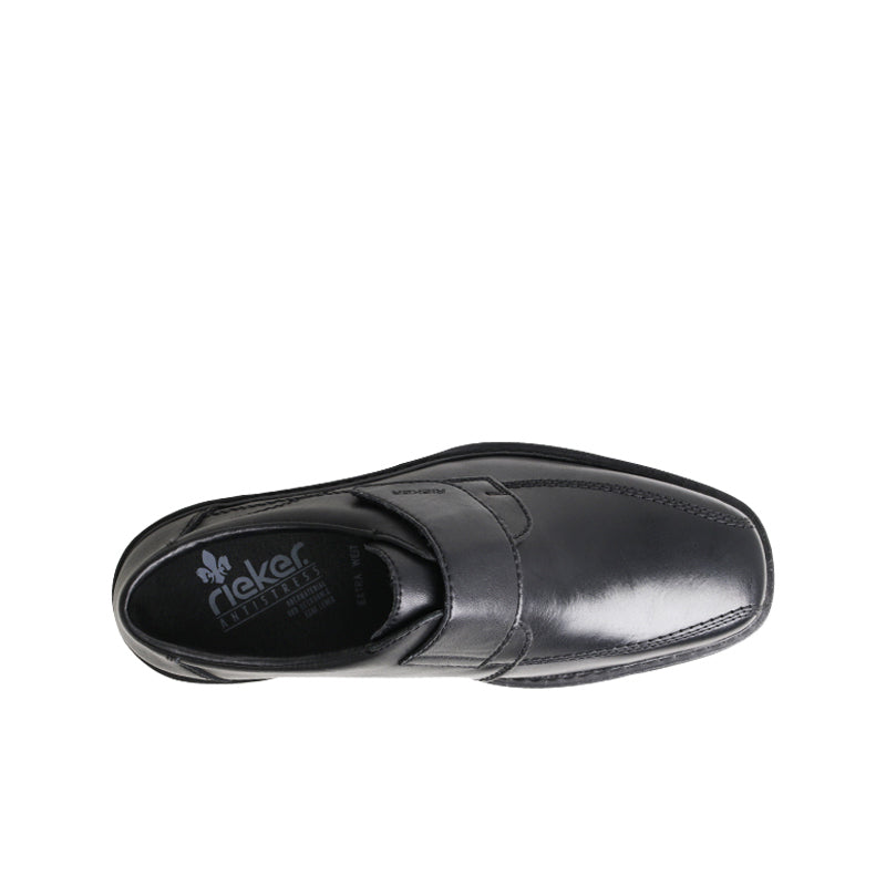 Men’s black leather slip-on dress shoe, side view with stitched panels and toe cap