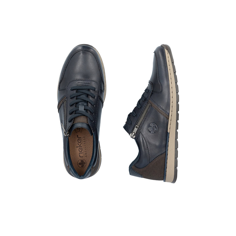 Men's lace-up sneaker with side zip, dark blue upper and light tread outsole.