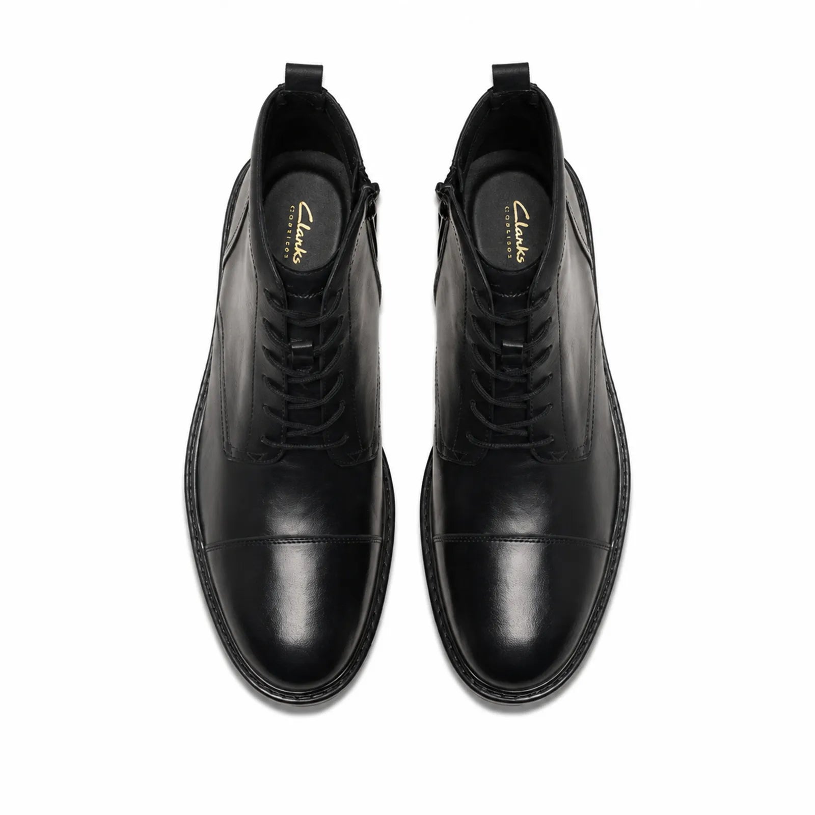 Pair of men's black leather lace-up ankle boots, top view