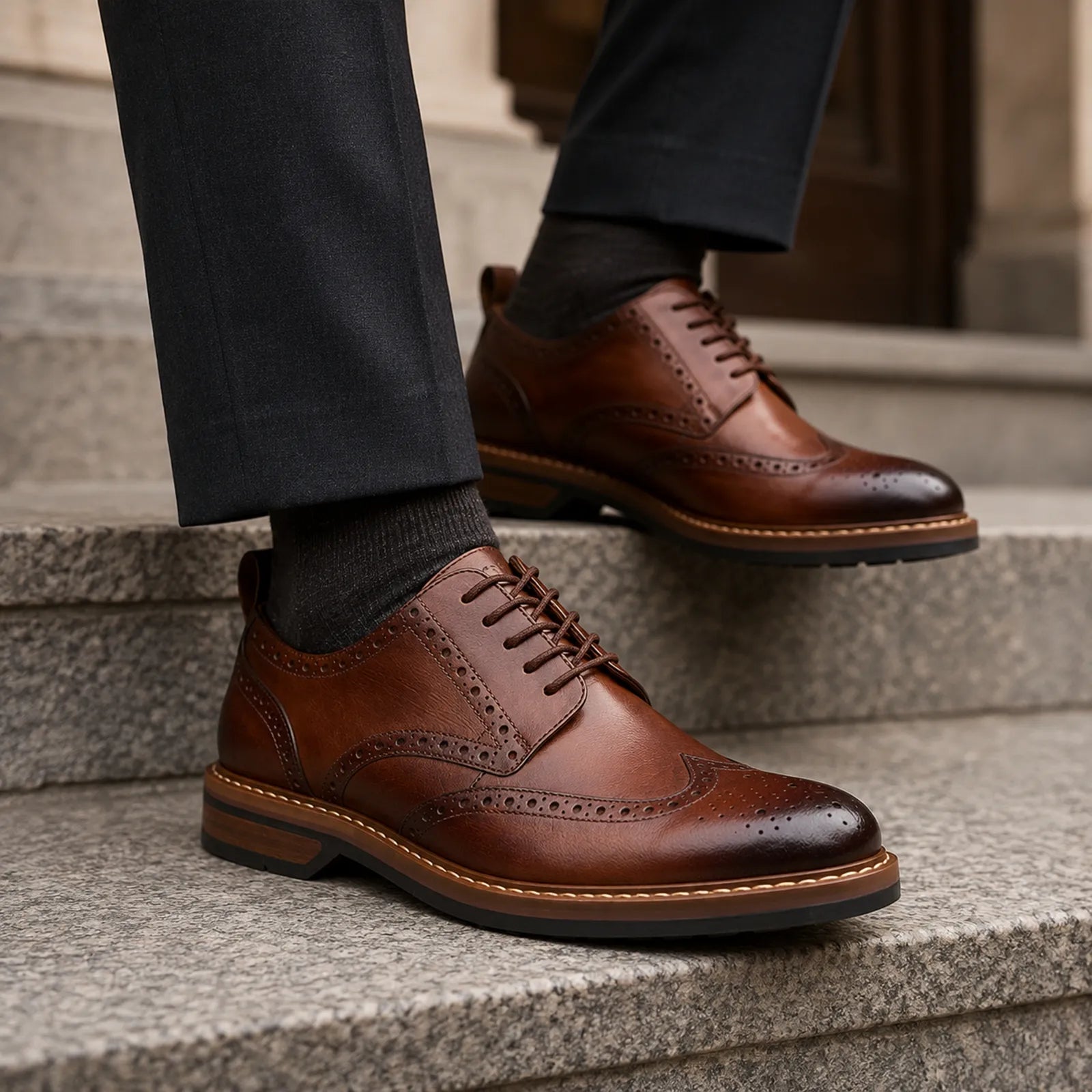 Brown leather lace-up business shoe with brogue panels and rubber sole