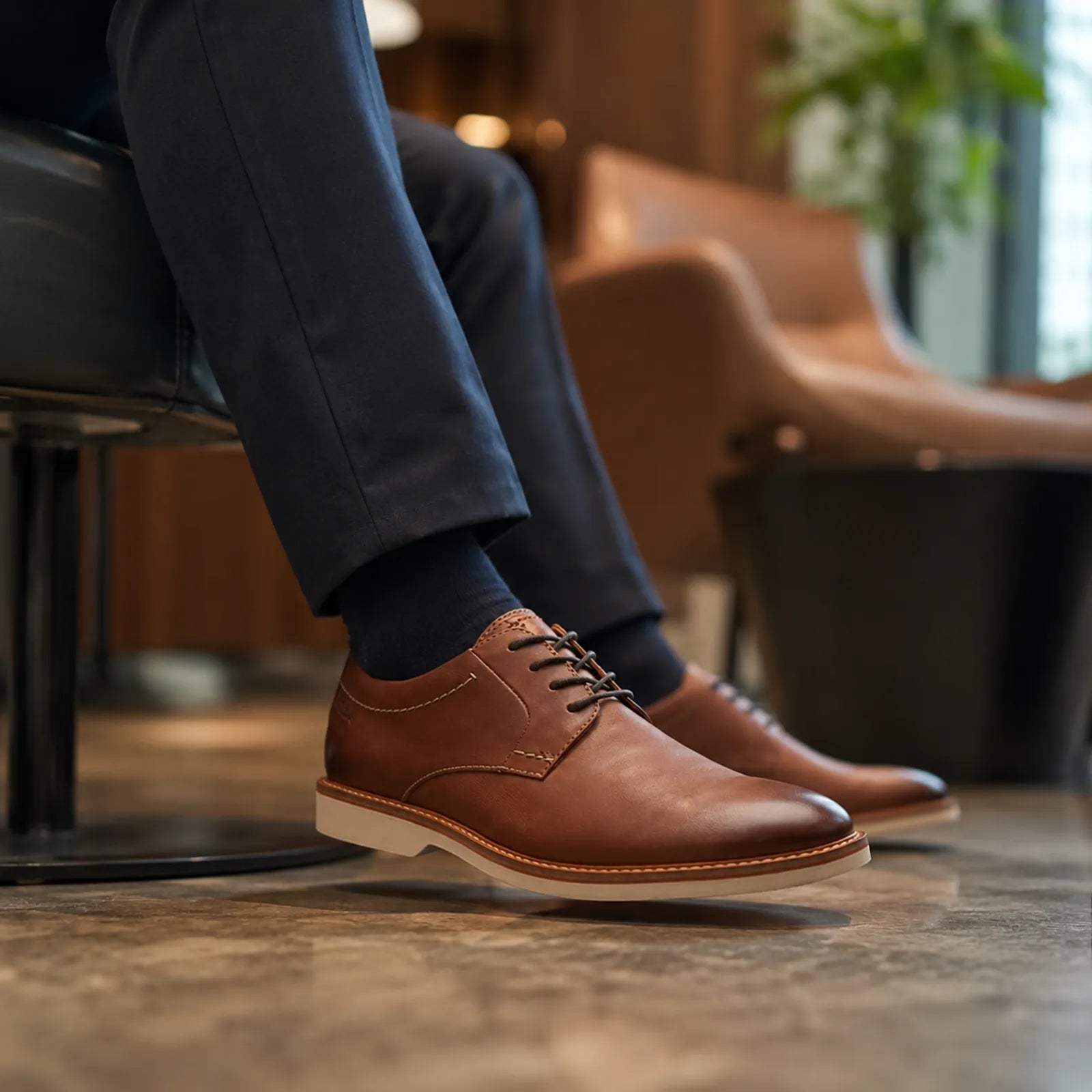 Men's dark brown leather lace-up dress shoes, stitched upper and rubber sole