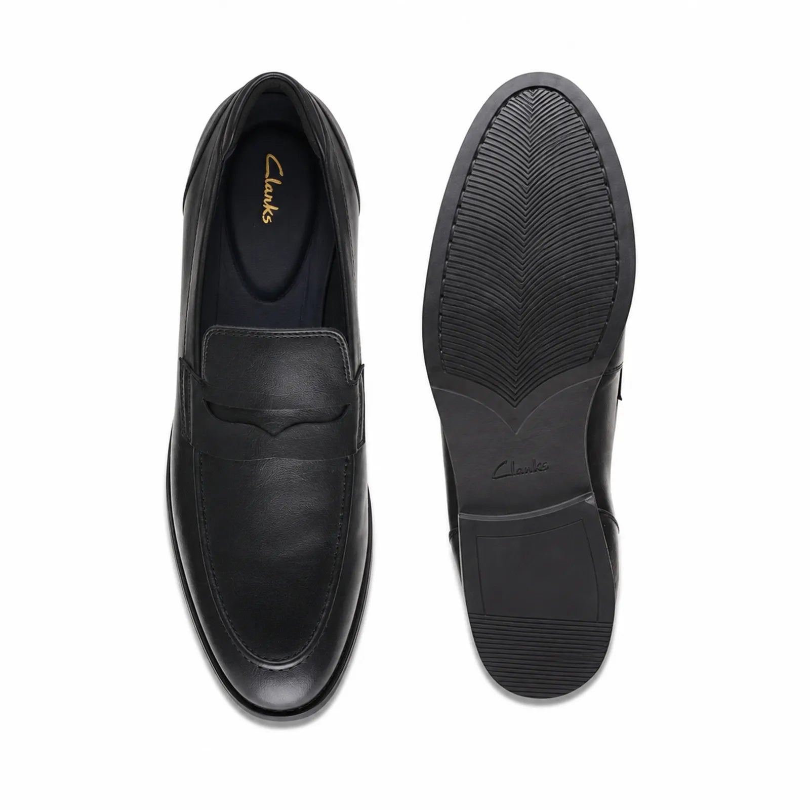 Black leather loafer pair view with cushioned collar and textured rubber outsole