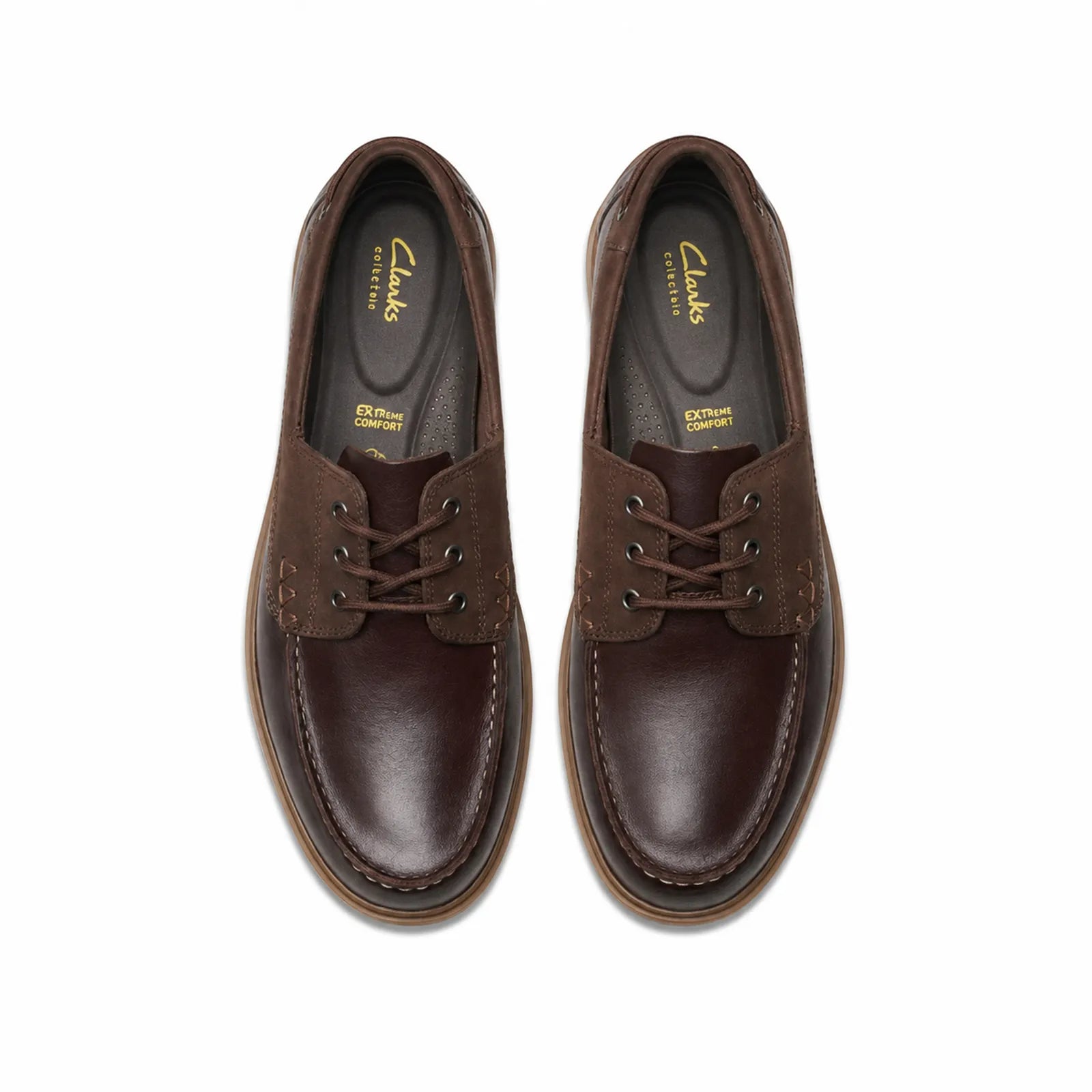 Dark brown leather boat shoes, lace-up with moc-toe stitching and cushioned insole