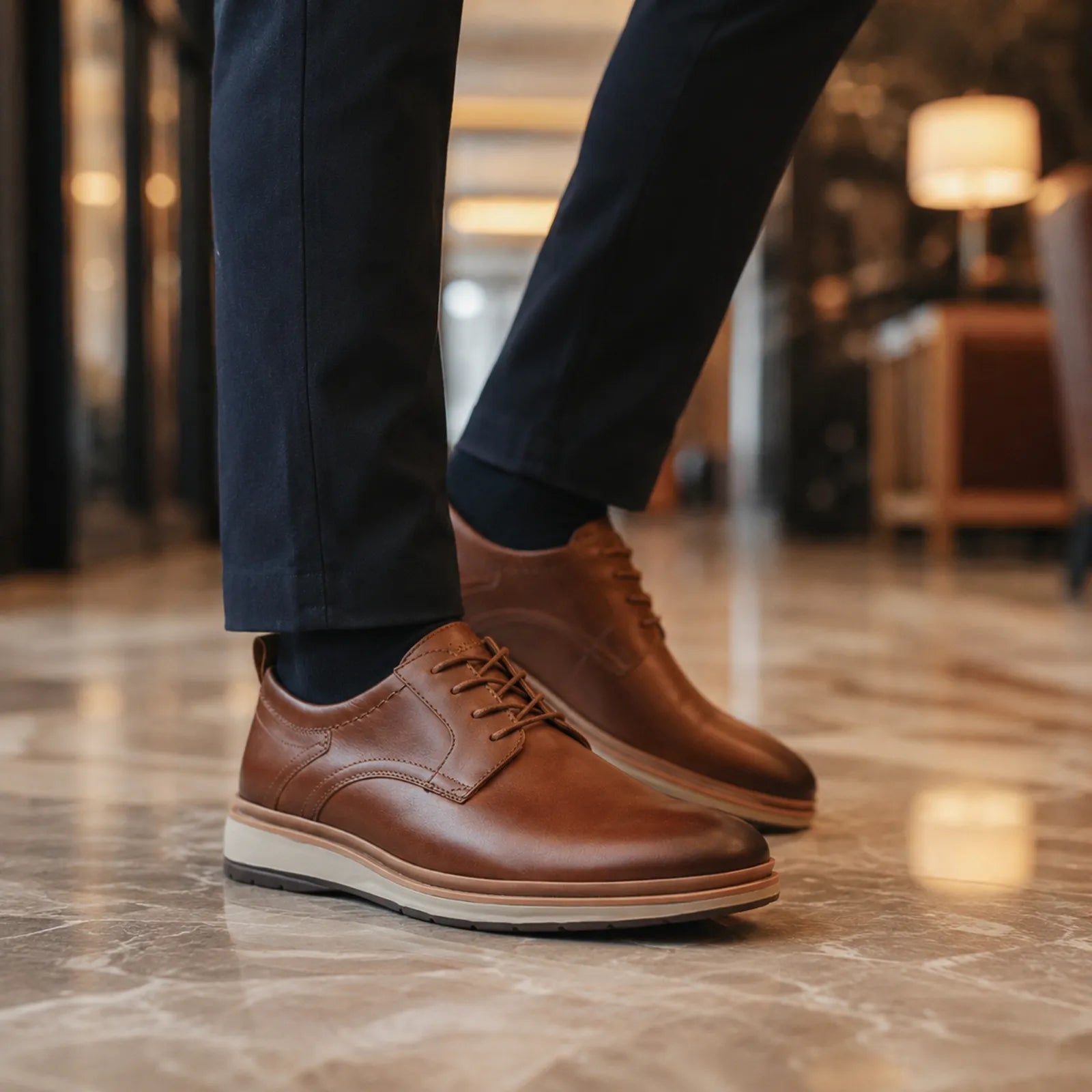 Men's brown leather lace-up business shoes, close side view of sole