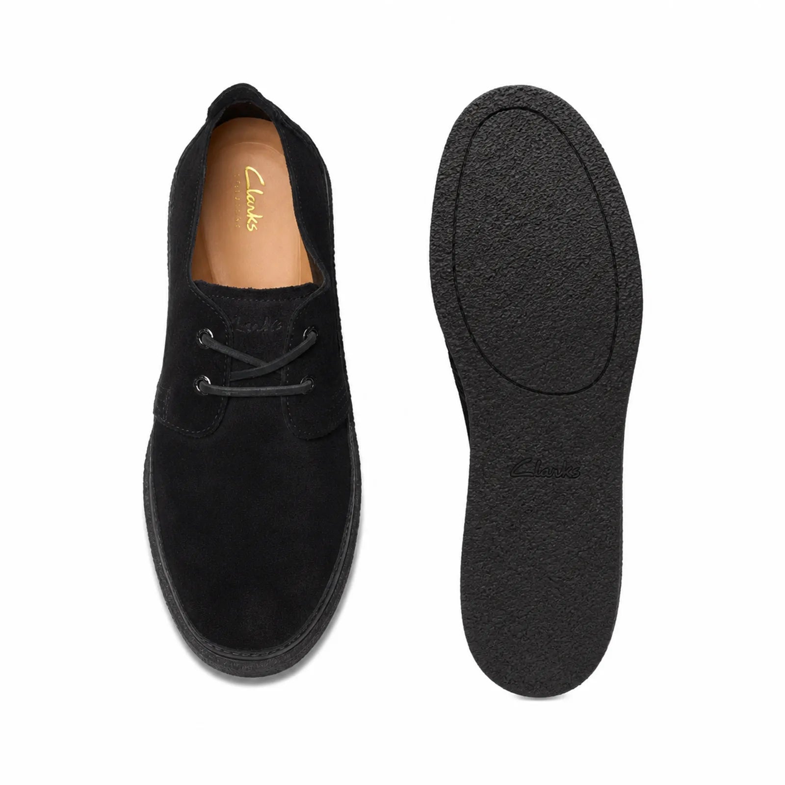 Pair of men's black leather lace-up low loafers, top view and textured outsole