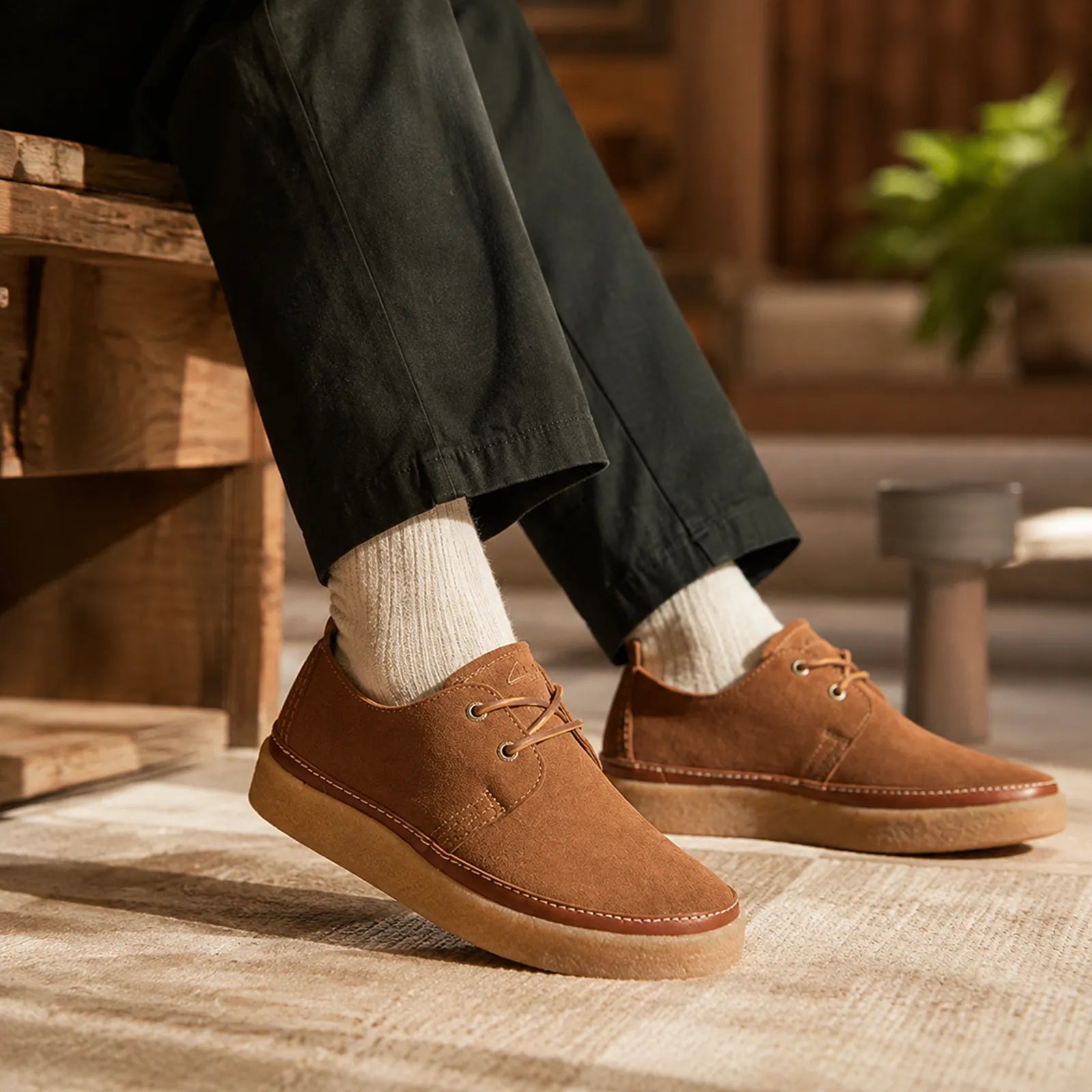 Men's brown leather lace-up low loafers with stitched seams and cushioned sole