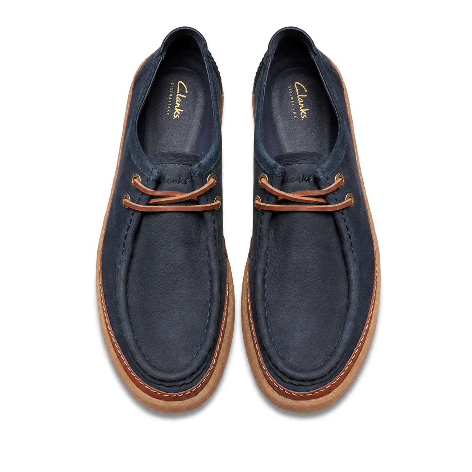 Pair of men's dark blue suede lace-up loafers with brown moc stitching