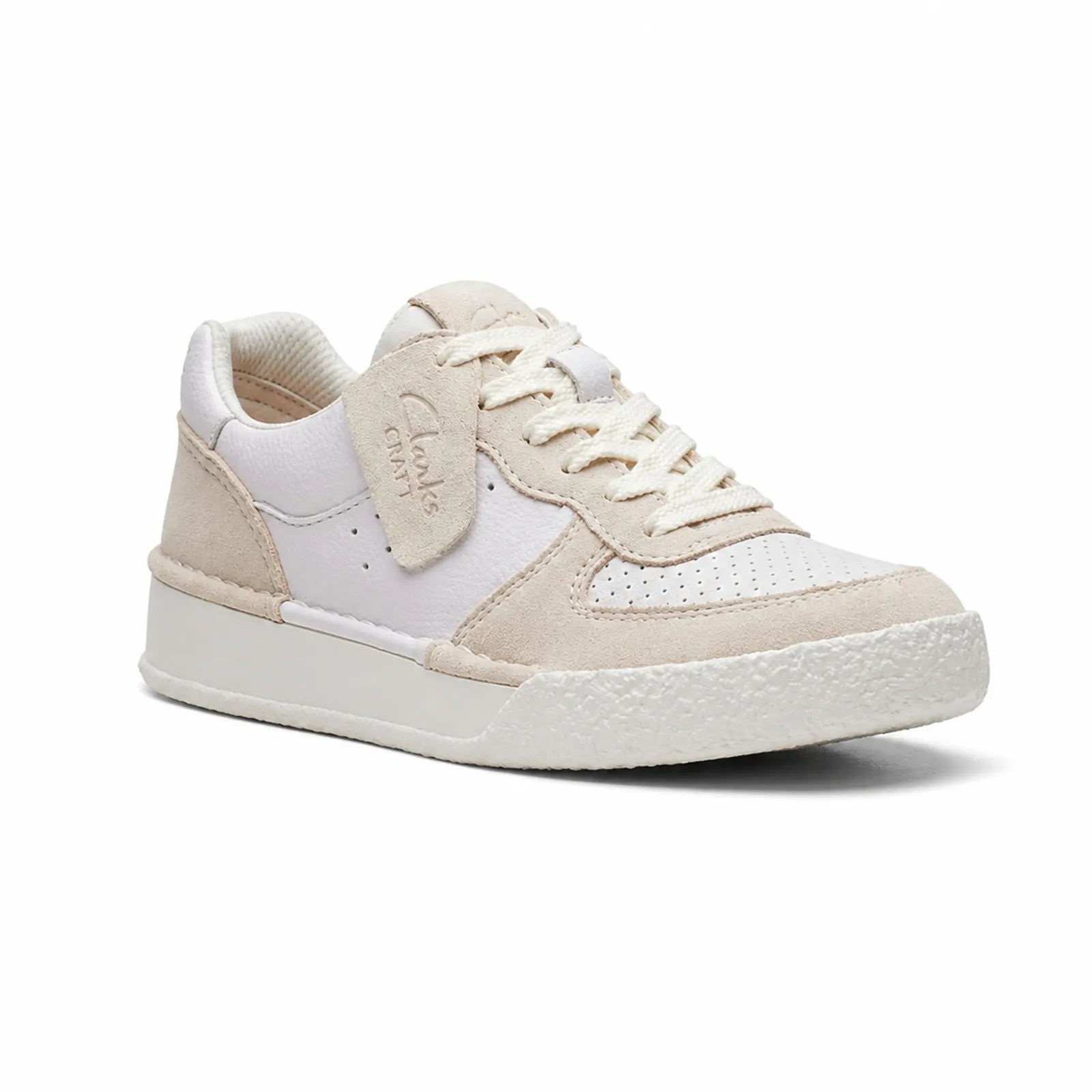 Women’s sneakers in pale peach and white with lace-up and textured outsole