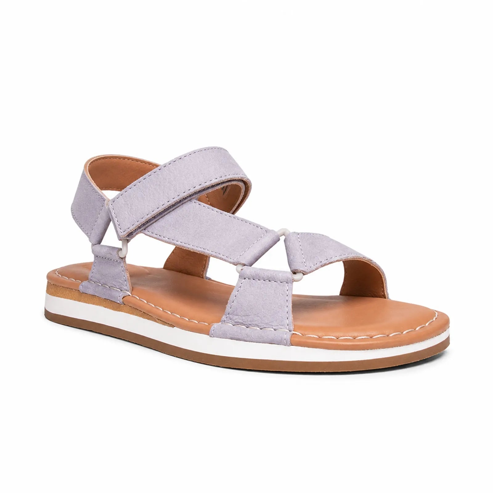 Lilac flat sandals with two wide straps and open toe, side view