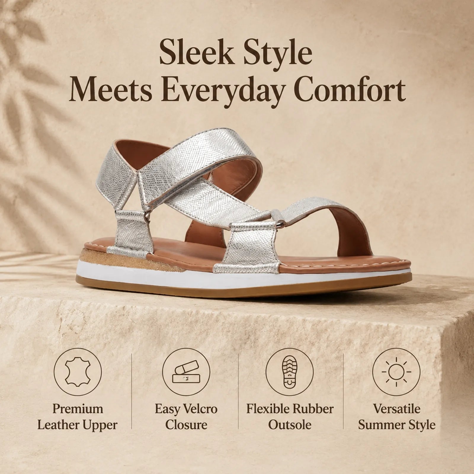 Women’s silver Velcro sport sandals with two ankle straps and cushioned sole