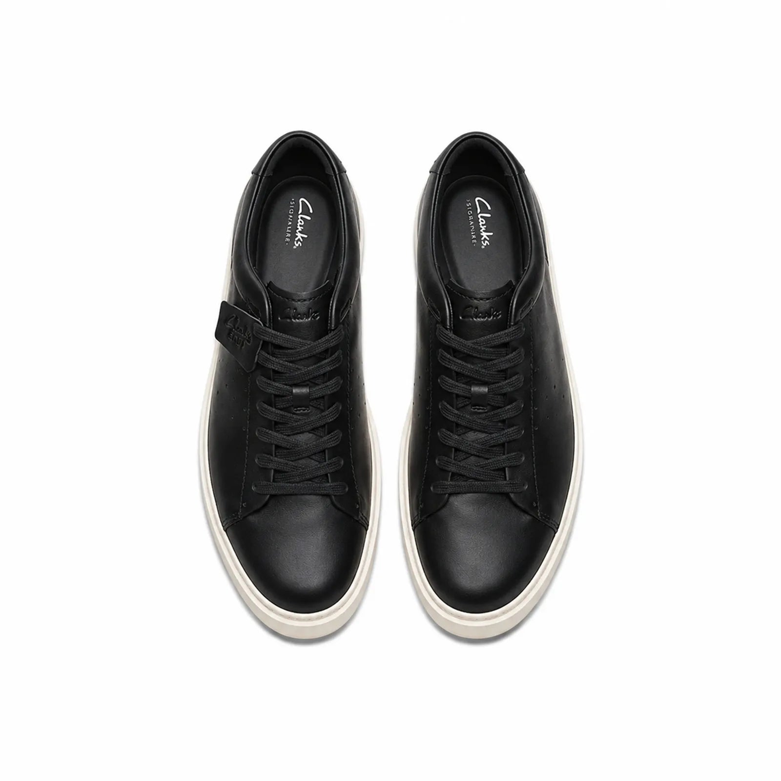 Black leather lace-up low-top sneakers, pair view, white rubber soles.